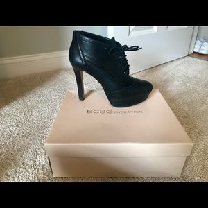 BCBG Generation black heeled booties.